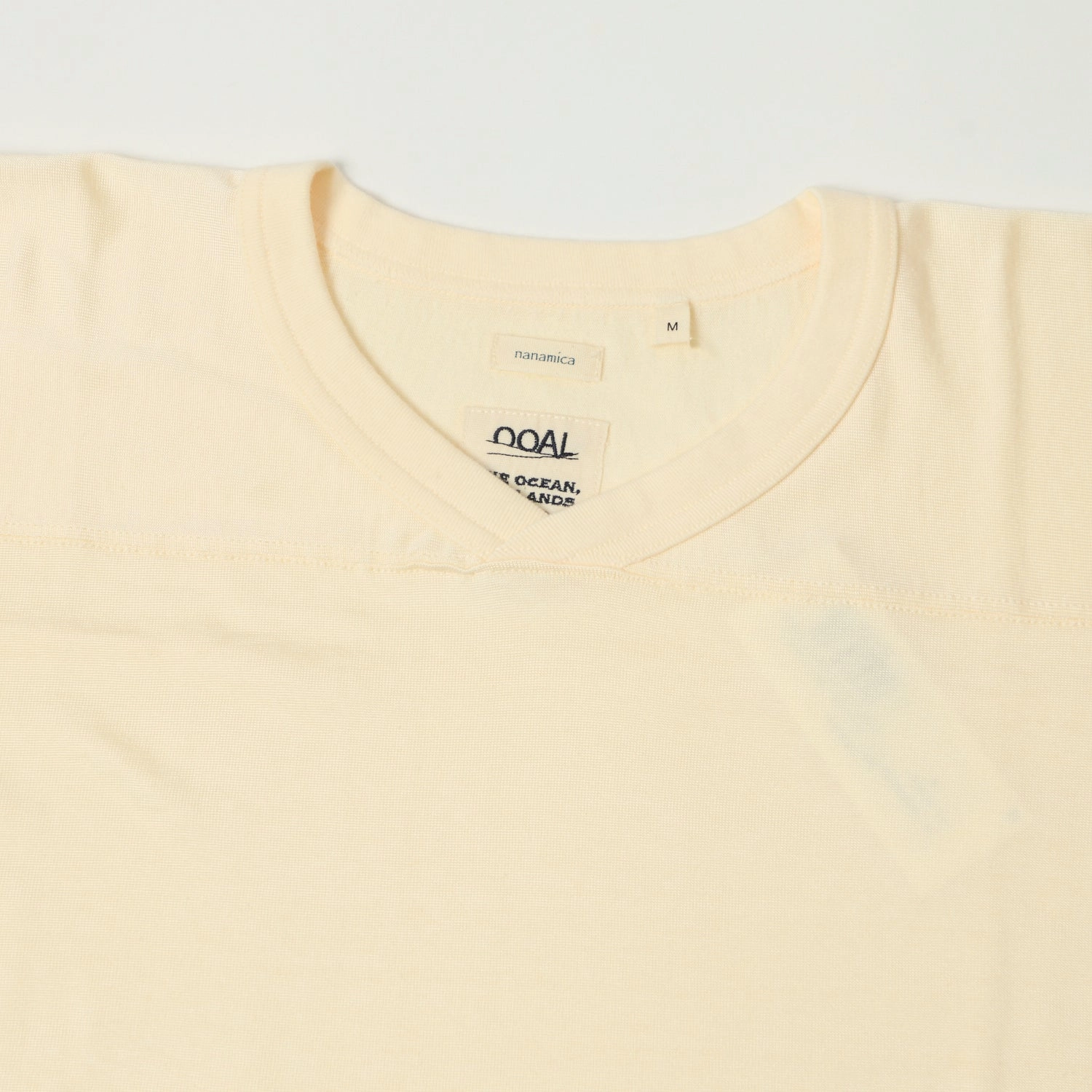 NonRestrictiveCut Nanamica Rayon Cotton Football T-Shirt - Ivory